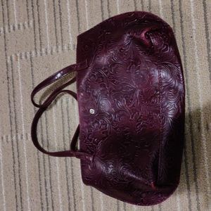 Burgundy faux leather Victorias secret handbag